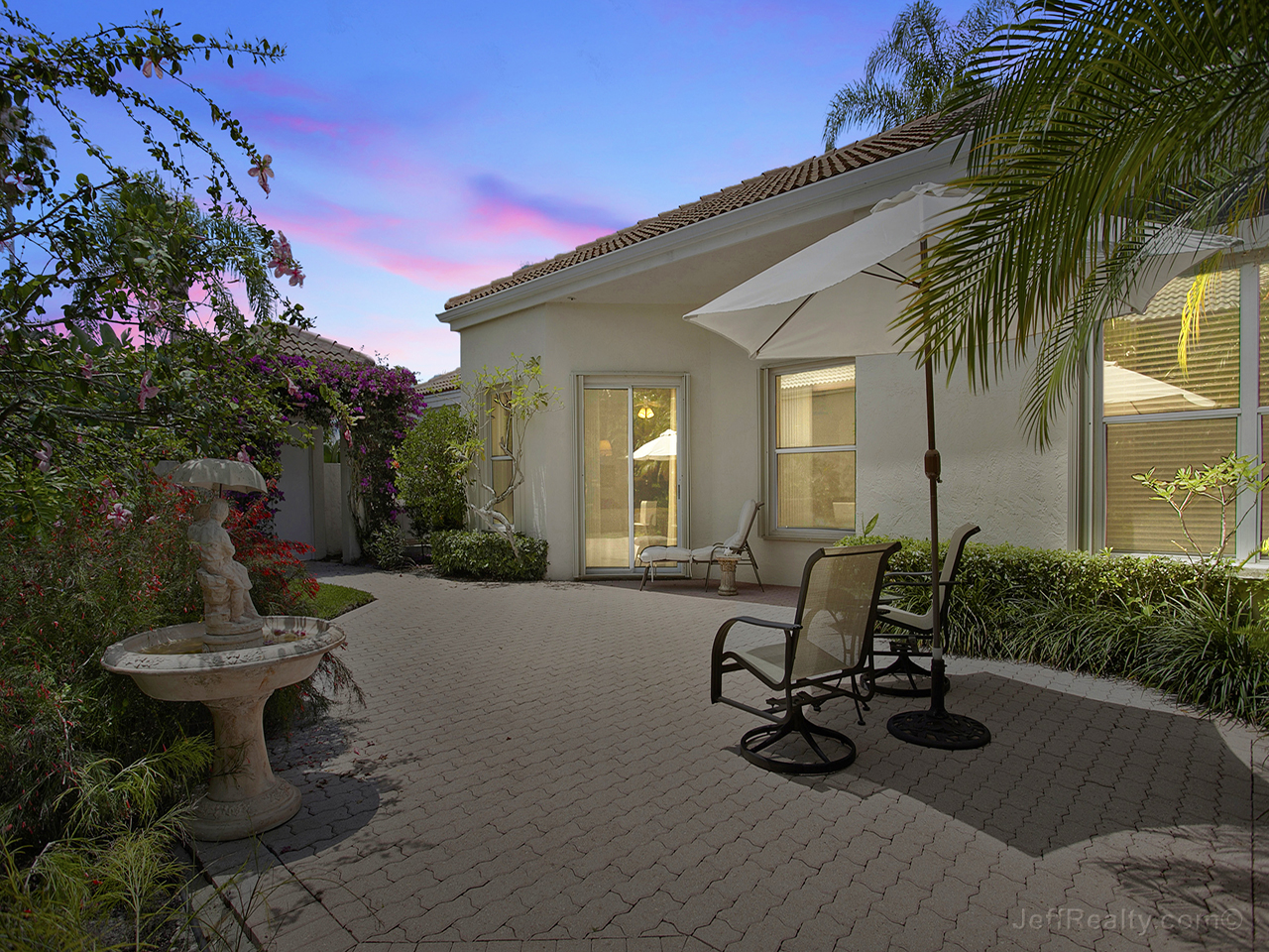 116 Coral Cay Drive - Back & Patio at Dusk