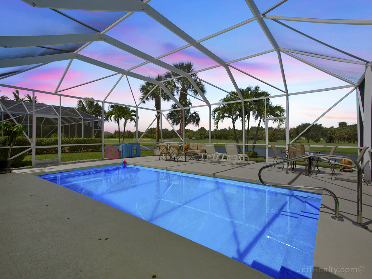 132 Barbados Drive - Screened Patio & Swimming Pool at Sunset