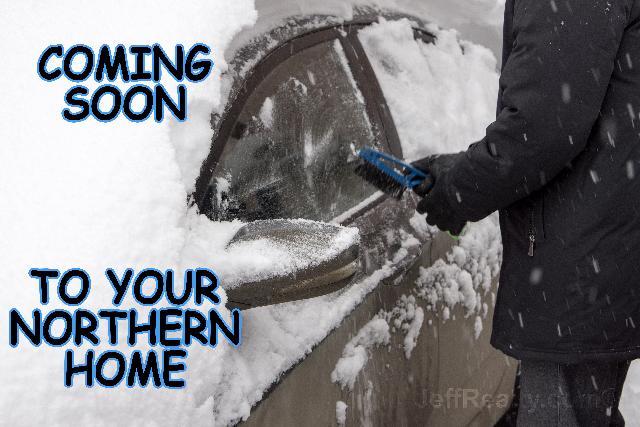 Man-clean-the-car-after-a-snowfall